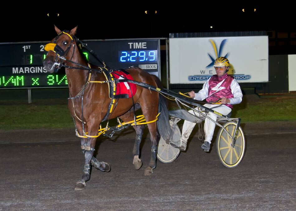 PAST GLORY: Mitch Faulkner and Somebeach N Clovelly after a previous win at Tamworth. Photo: PeterMac Photography.