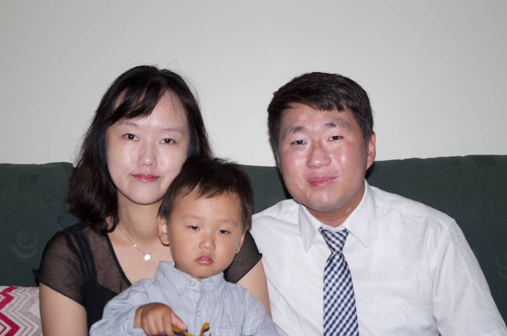 Multiculturalism in action: Pastor Yeongmin Hong with his wife Narae and three-year-old son Yejun.