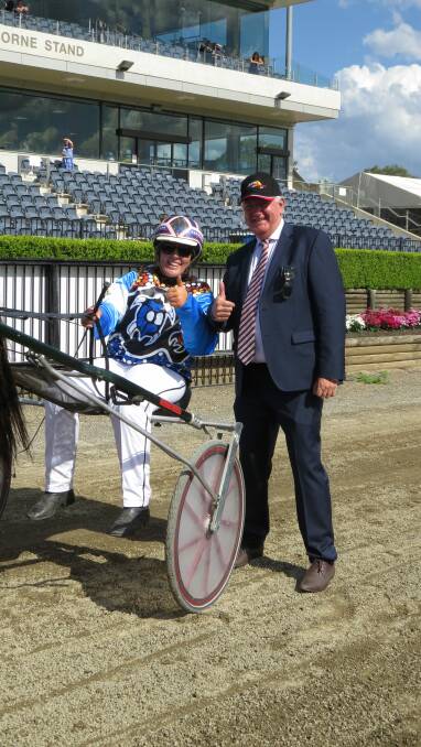 Top job: McKayler Barnes and Club Menangle board director Michael Brown after the JC Caffyn Indigenous Drivers Plate at Menangle.