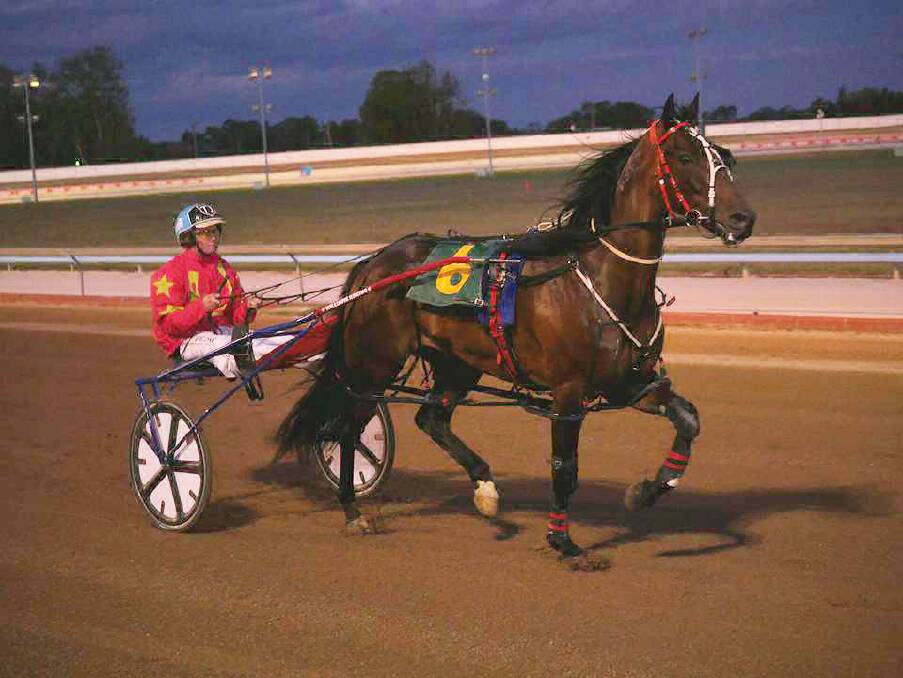 All-the-way win: Comeon Howzat at Maitland last Sunday with Tom Ison in the spider. Picture: Grahame Heuston