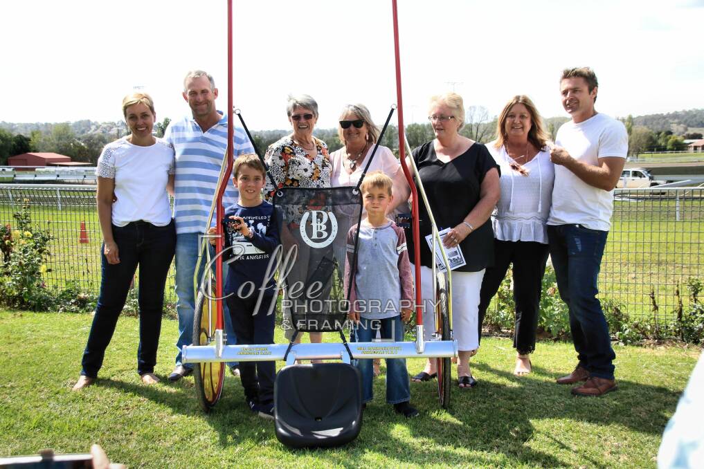 The Missile Gig: The Barraclough and Ward families stand by the gig which was the trophy. Picture: Coffee Photography.