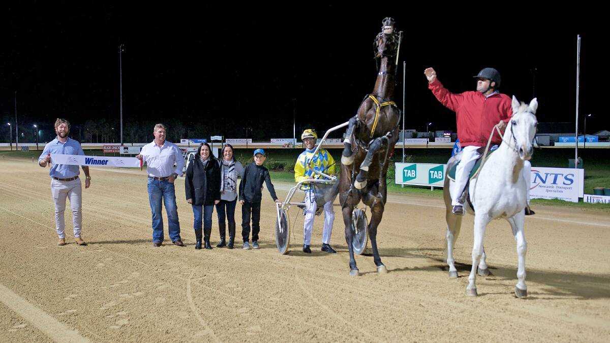 Strides ahead: Downunder Stride with Mark Callaghan after a win at Newcastle on Saturday night. Photo: First Place Photography