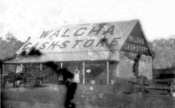 Damaged piece of history: A much-damaged photo of the Fulton & Abernethy Cash Store. The building was destroyed by fire in 1944.
