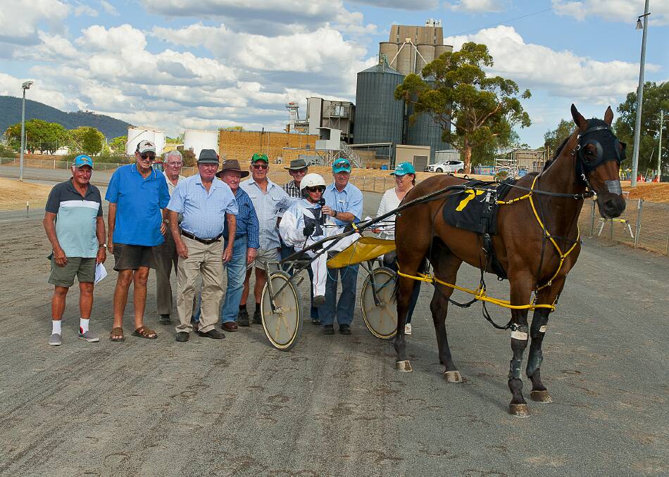 Spud Verning, Bob Ballantine, Laurie James, Toby Grant, Ron Miller, John Veness, Milton Muggleton, Dean Chapple in the gig with the winner of the Old Boys Pace Summer Money from the Peter Shepherdson stables at Narrabri.