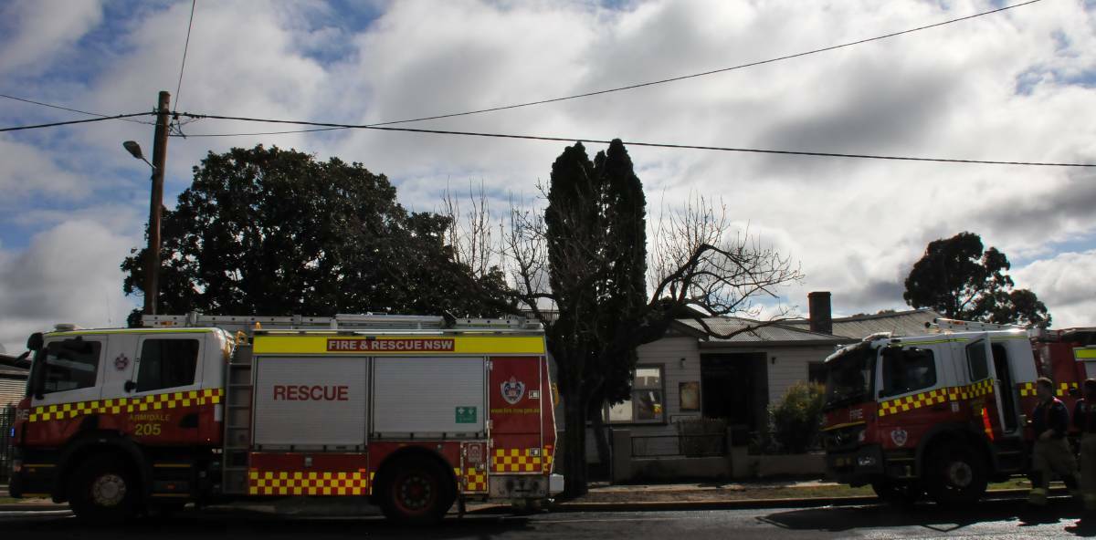 DESTROYED: Emergency crews respond to reports of a fire at The Armidale Club early Friday morning. Photo: Armidale Express
