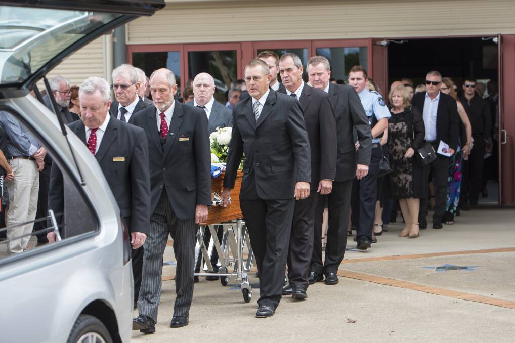 VALE: Hundreds of family, friends and former teammates packed out TREC on Tuesday to farewell sporting great, Michael Adams. Photo: Peter Hardin
