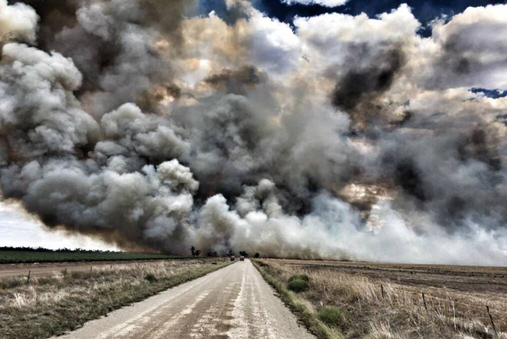 BIG BLAZE: Smoke engulfs paddocks near Boggabri on Sunday. The fire status is now listed as "under control". Photo: FRNSW 399 Narrabri Fire & Rescue