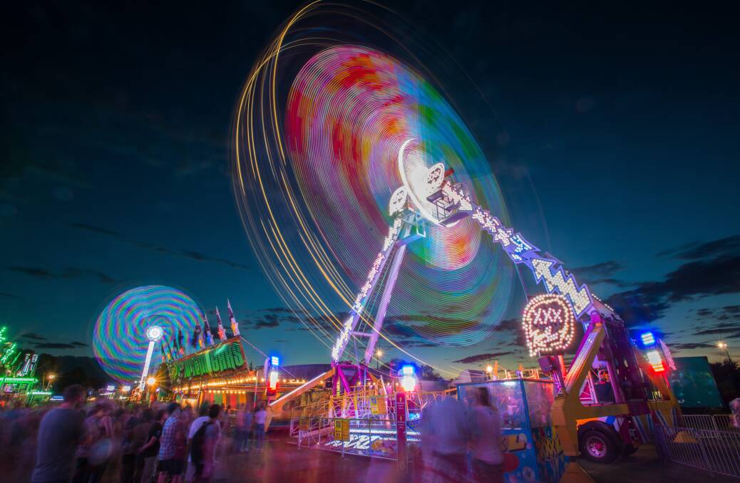ON SHOW: Rides keep punters happy at the Tamworth Show on Saturday night. Photo: Peter Hardin