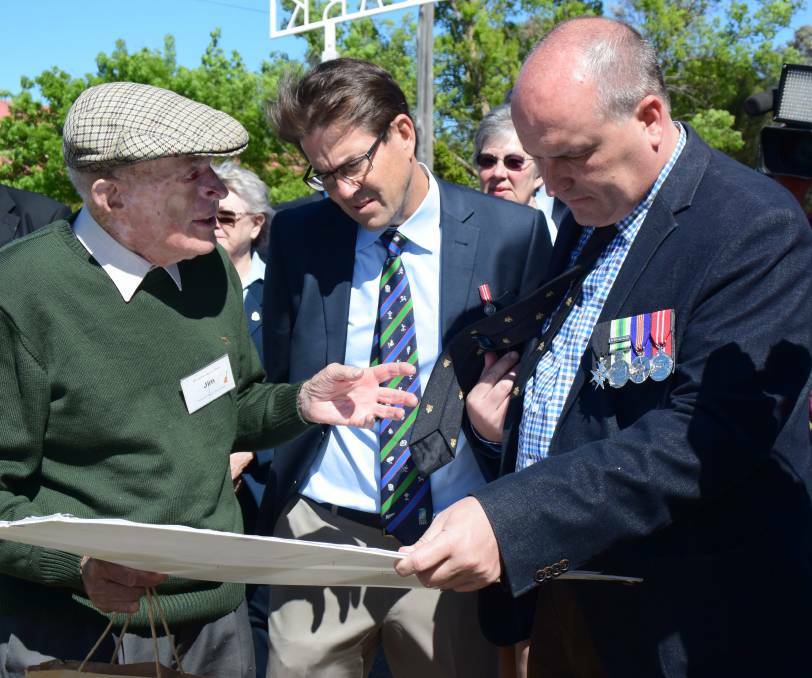 APPRECIATED: Jim Finucane shows Tamworth MP Kevin Anderson and veterans affairs minister David Elliott the plans to revitalise the park. Photo: Haley Craig