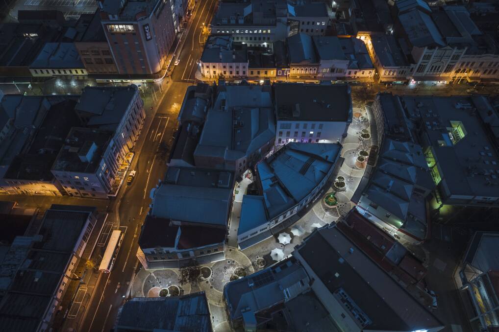 Aerial shot of night-time lighting in Quadrant Mall with new LED lighting and older orange lighting