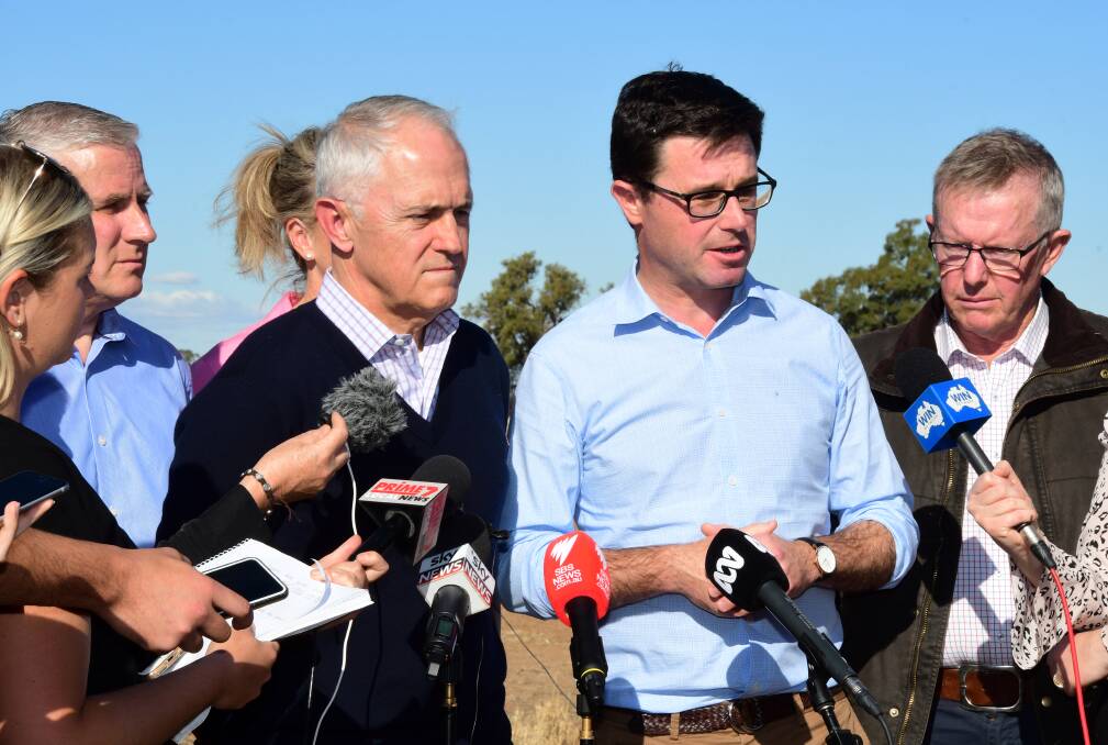 HERE TO LISTEN: Prime Minister Malcolm Turnbull and Agriculture Minister David Littleproud address the media at the 'Strathmore' property south of Trangie. Photo: BELINDA SOOLE