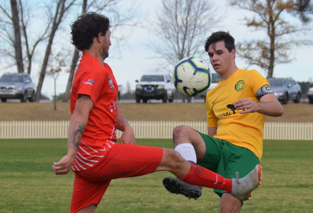 CLOSE FINISH: The Redmen fended off a fast-finishing South Armidale team on Saturday. 