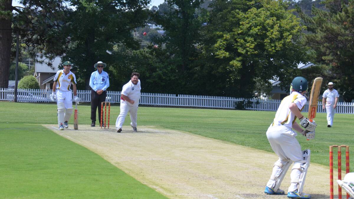 City's leading wicket-taker Simon Butler sends one down the pitch. 