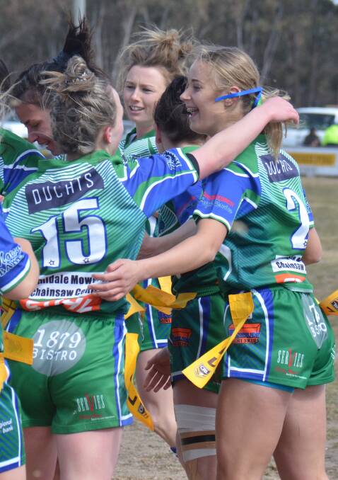 SWEET VICTORY: The Armidale Rams celebrate Hailee Grant's try against the Boars. 