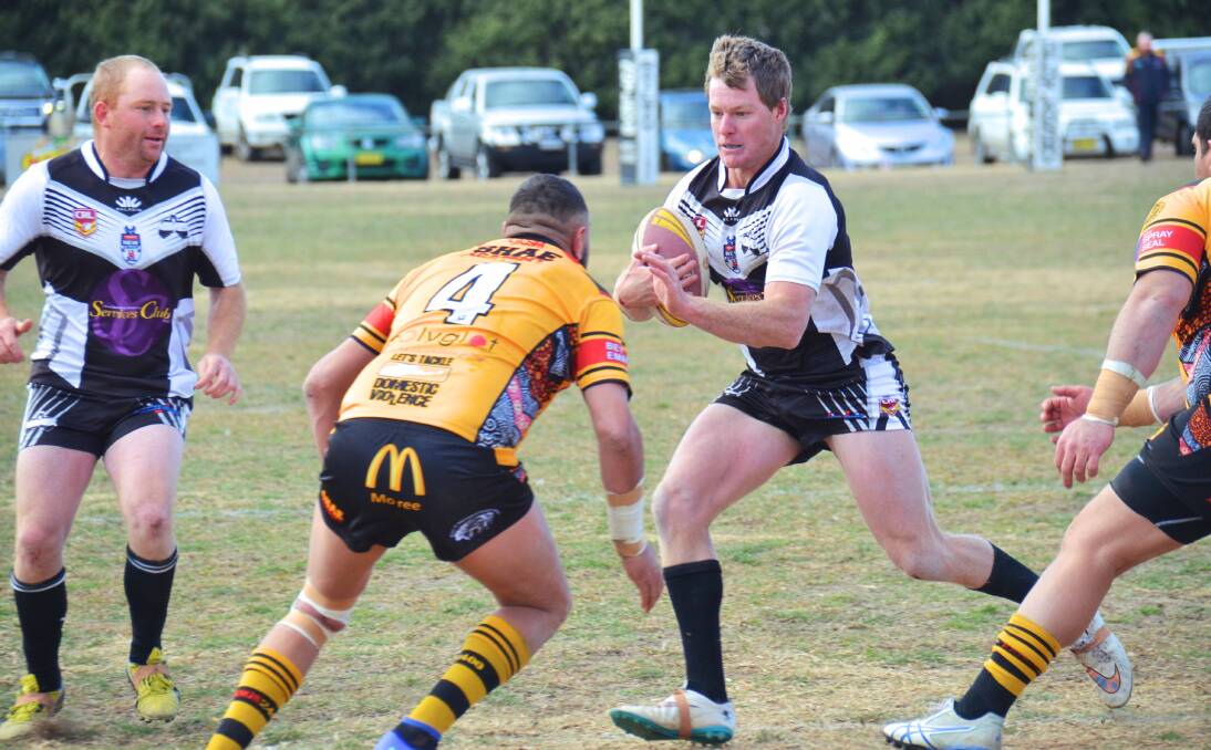 OFF TO THE BIG DANCE: Adam Morris takes on Boomerangs defenders in Sunday's major semi-final at Mead Park. 