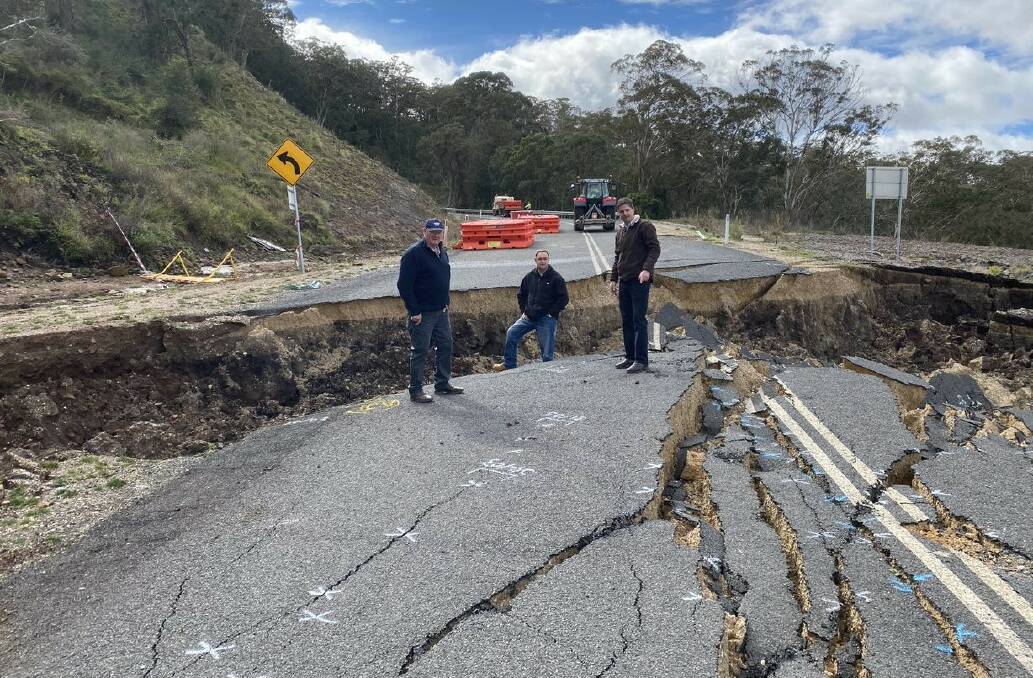 Upper Hunter mayor Maurice Collison, general manager Greg McDonald and Upper Hunter state MP David Layzell inspect a damaged section of Coulson's Creek Road in 2021. Picture supplied
