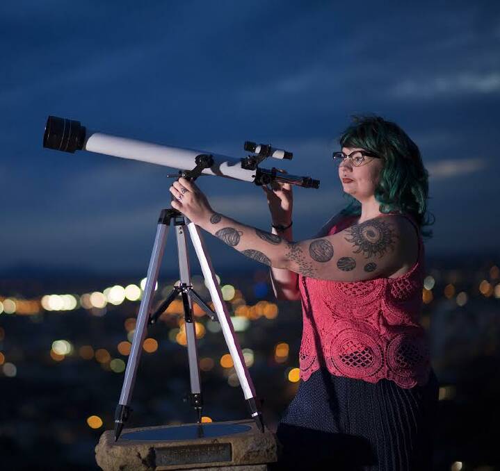 REACH FOR THE STARS: Karlie Noon has the solar system tattooed on her left arm, a testament to her passion for space. The former Tamworth woman is now on her way to completing a PhD.