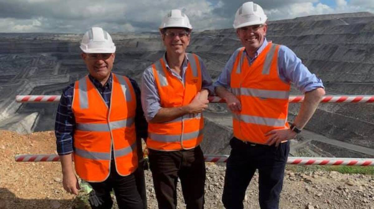 HIGH VISIBILITY: John Barilaro, David Layzell and Dominic Perrottet at Ravensworth mine last week.