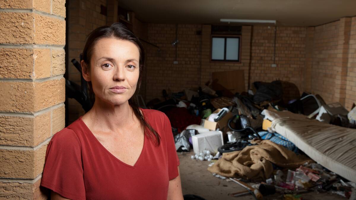 Tatum O'Meara is concerned a public housing property in her street has been untenanted and left in an unacceptable state for months. Picture: Sitthixay Ditthavong