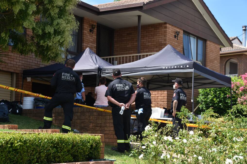 DRUG RAID: Specialist services were called in after police allegedly uncovered a laboratory. Photos: Andrew Messenger