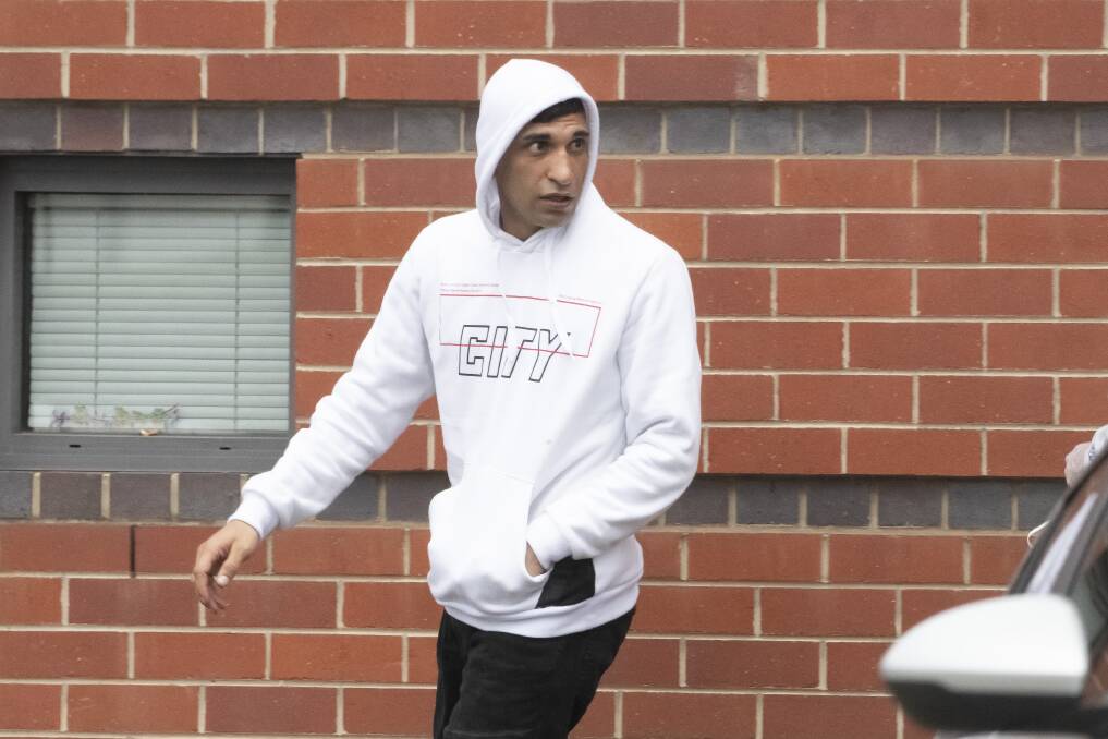 Ali Goulzari Anvar walks from Tamworth court after being handed a jail term in the community. Pictures by Peter Hardin