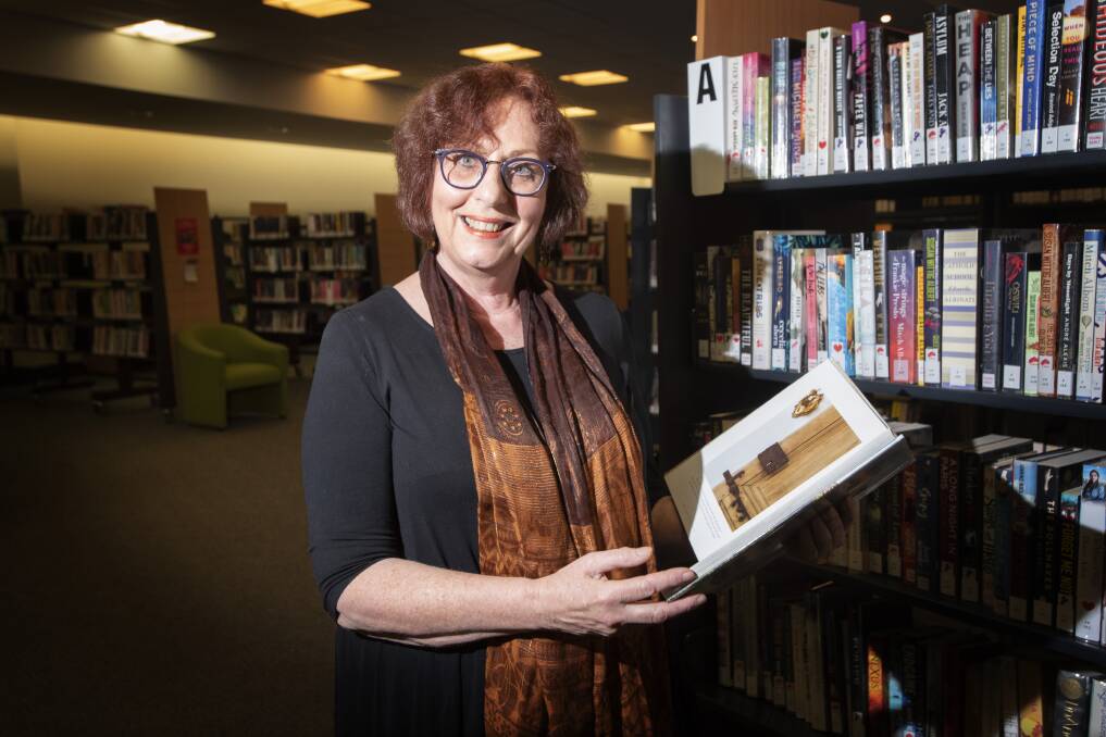 DOORS OPEN: Council's Kay Delahunt at the newly reopened Tamworth library. Photo: Peter Hardin 010620PHA013