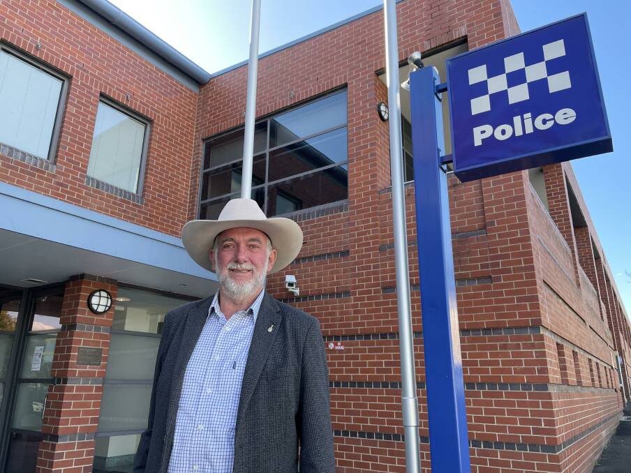 GOOD NEWS: Tamworth mayor Russell Webb at the police station after the announcement. Photo: Anna Falkenmire