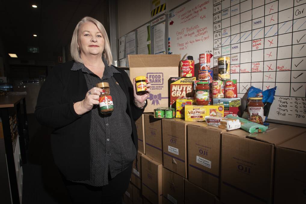 A HAND UP: Oxley Community Transport CEO Sharon Tibbs teamed up with Liberty Foodcare for a food drop project. Photo: Peter Hardin