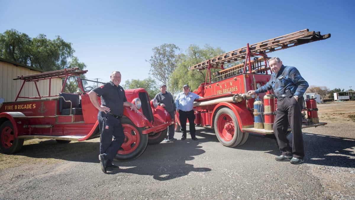BIG RED RIGS: Tom Cooper, Bob Hancock, Tony Dewhurst and Merv Bailey with some vintage appliances. Photo: Peter Hardin, 2019