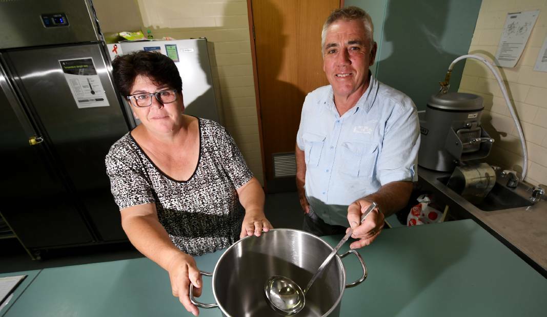 EAT UP: Cornerstone Kitchen chef Jenny Hatch and Minister Glenn Maybury. Photo: Gareth Gardner, file