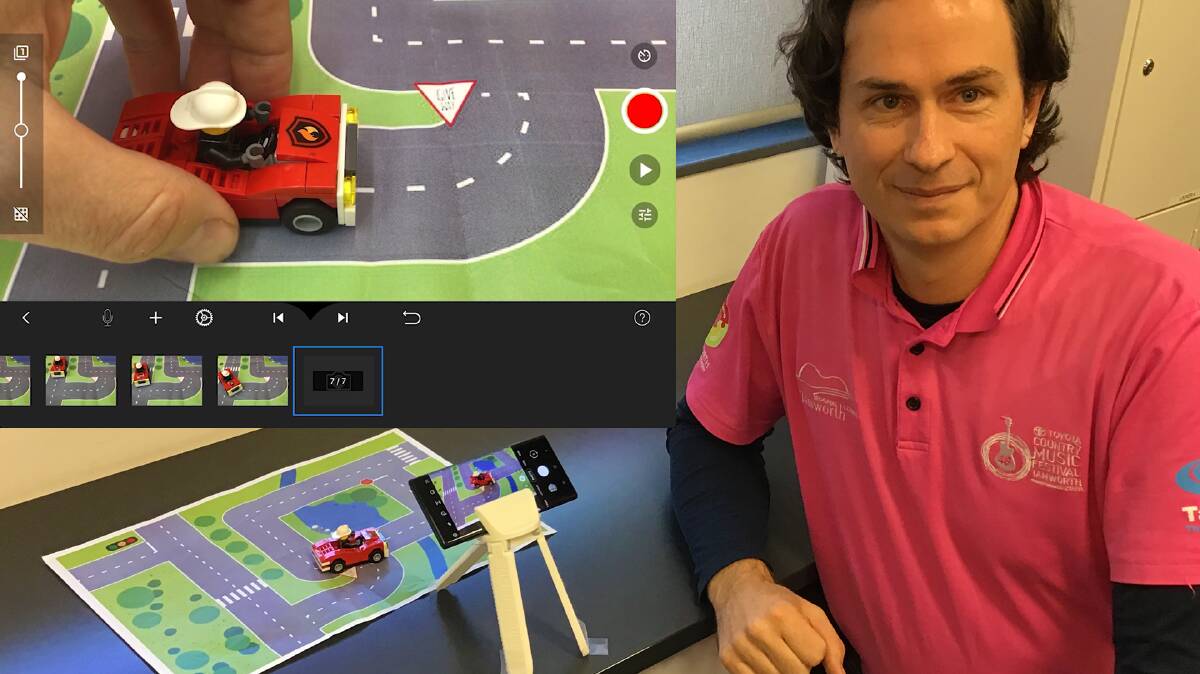 STOP AND GO: Julian Mann filming a virtual school holiday tutorial, showing kids how to make a stop motion animation. Photo: Supplied