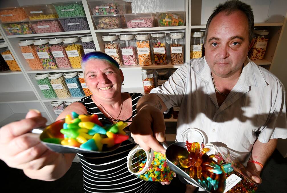 NOVELTY TREATS: Michelle and Brett Hutchins plan to open their new lolly shop on the corner of Bourke and Peel Streets on Saturday. Photo: Gareth Gardner