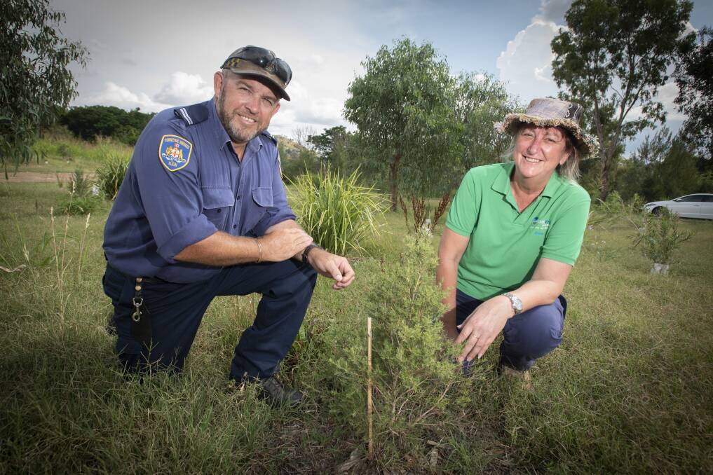 NURTURING: Corrective Services NSW Tamworth's Dean Hensley with Tamworth Regional Landcare Asssociation's Anne Michie at the riverside site. Photo: Peter Hardin