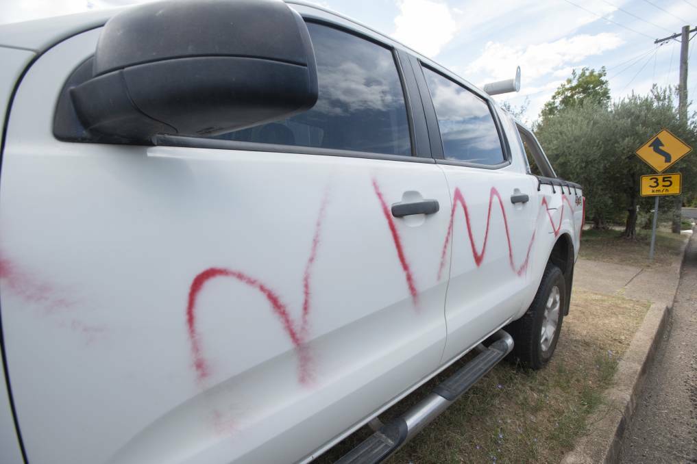 RED-HANDED: Police caught two men red-handed after scores of cars in South Tamworth were vandalised with spray paint. Photo: Peter Hardin