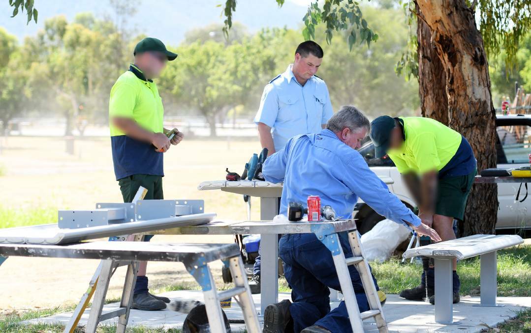 HELPING HANDS: Inmates helped to install a picnic table and benches on their slab in early 2019, for the community to enjoy. Photo: Gareth Gardner, 2019