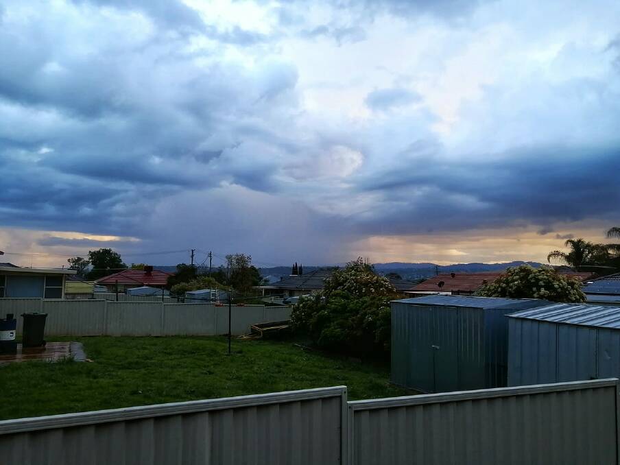 STORM CLOUDS: Tamworth Regional Weather's Dave Farrenden snapped this rain shaft from in town looking towards Moore Creek on Thursday morning. Photo: Dave Farrenden
