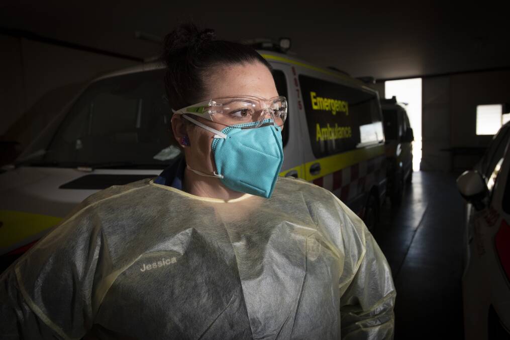 HARD WORK: Tamworth paramedic Jess Townsend has to wear personal protective gear at every single job. Photo: Peter Hardin 080921PHA025