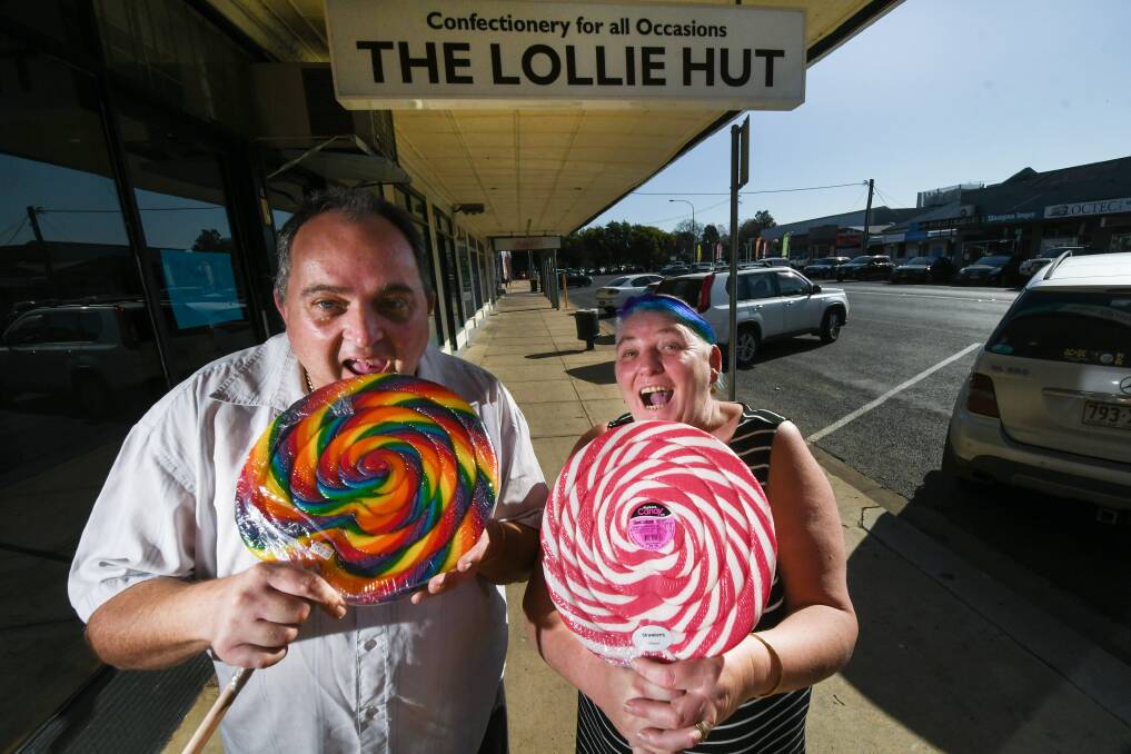 SWEET TOOTH: Brett and Michelle Hutchins said the best part about owning a lolly shop is putting smiles on people's faces. Photo: Gareth Gardner