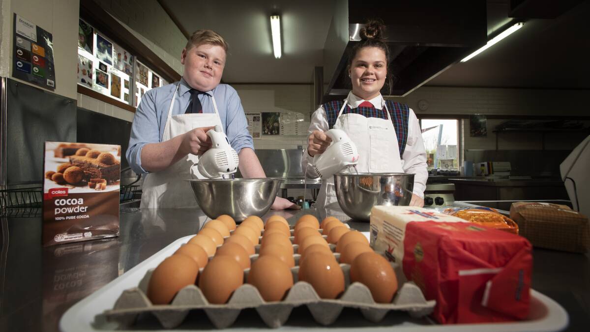 BAKE OFF: Calrossy students Jack McDonald and Ella Castle took part in a Tamworth Show-style cooking competition. Photo: Peter Hardin