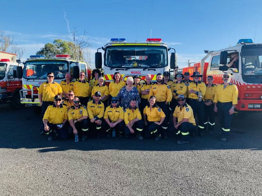 LOCAL HEROES: Moree mayor Katrina Humphries met with Rural Fire Service crews in town to lend a hand with the flood clean-up. Photo: NSW RFS