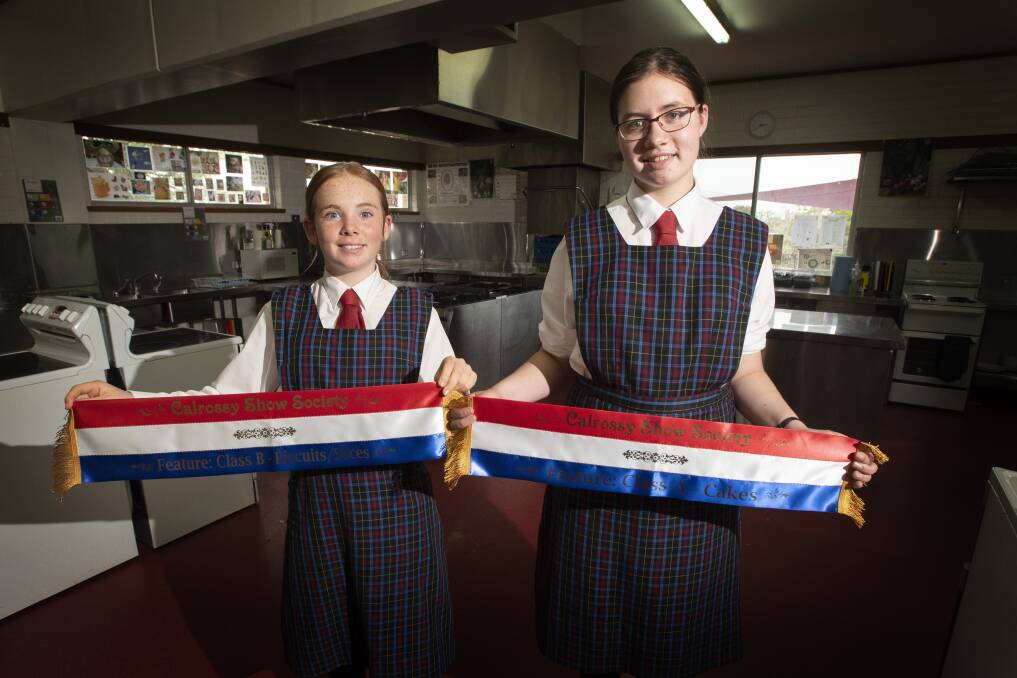 BAKING QUEENS: Calrossy students Gronnie Sheperd and Zanthie Hewett took out the top spots in the competition. Photo: Peter Hardin 090920PHE003