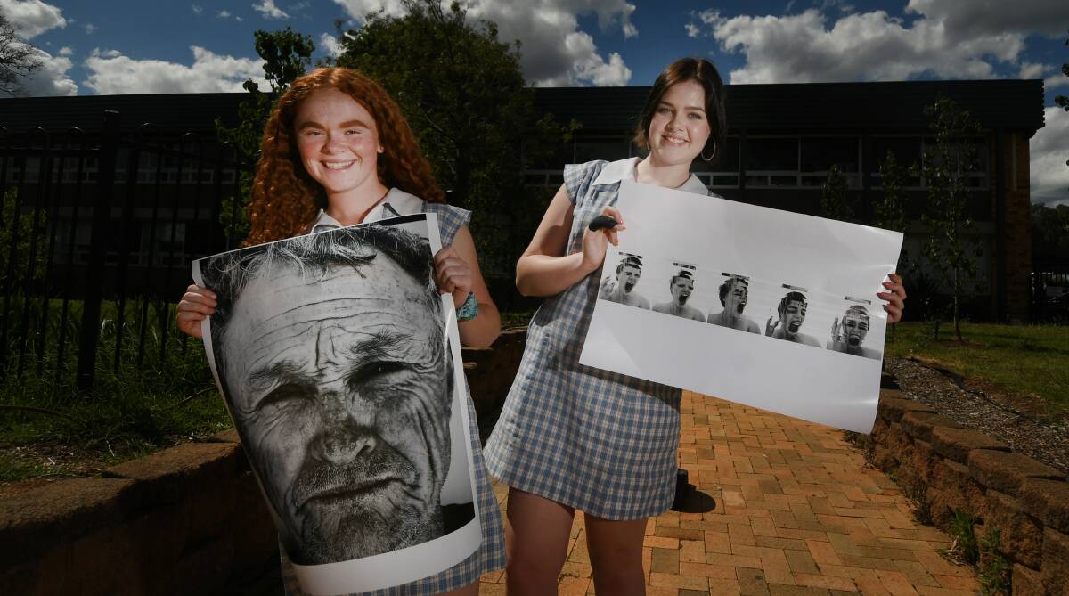 HARD WORK: Oxley High School students Elly Chapple and Charlotte Baker have had their major works of art pre-selected for the prestigious Art Express exhibition. Photo: Gareth Gardner