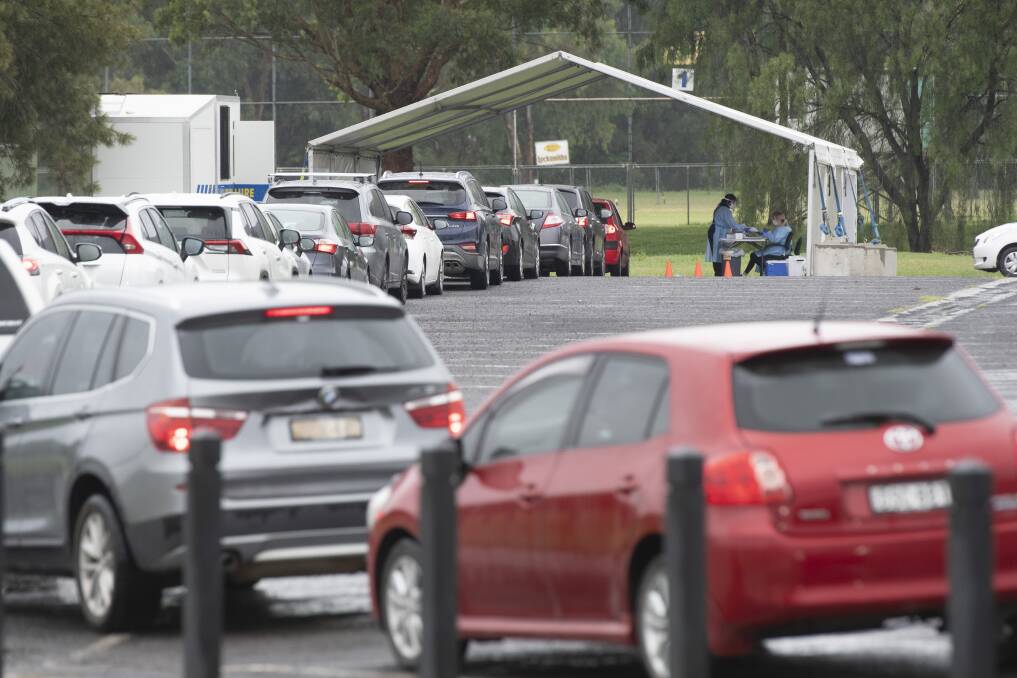 COVID QUEUES: Tamworth's drive-through testing tent had a line-up of cars waiting for a swab on Monday morning. Photo: Peter Hardin