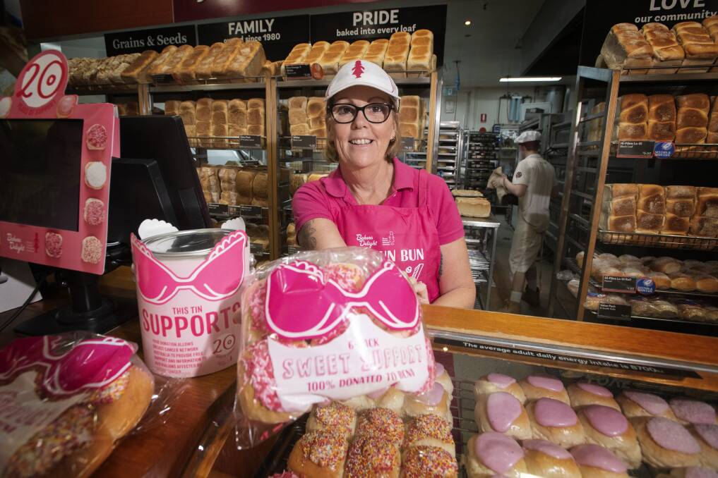 PRETTY PINK: Bakers Delight Tamworth franchisee Lee Crelley said the pink buns are a popular treat. Photo: Peter Hardin