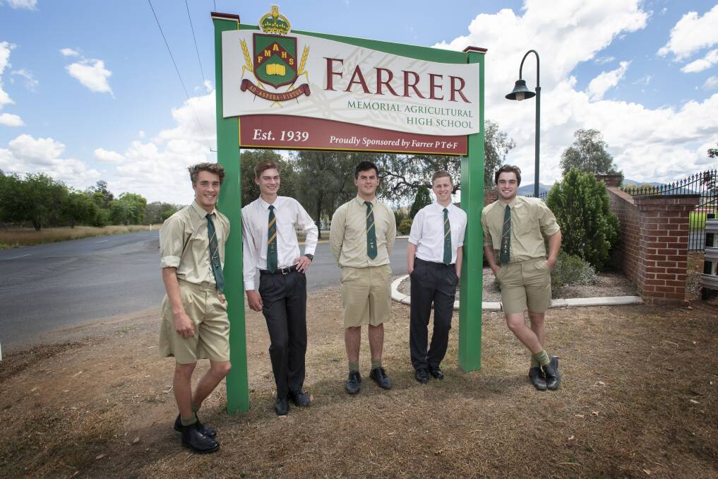 ONE DOWN: Year 12 students Wyatt Smith, Liam Rodgers, Zac McNee, Nick Quinn and Walker Harrison after they finished their first written HSC paper. Photo: Peter Hardin