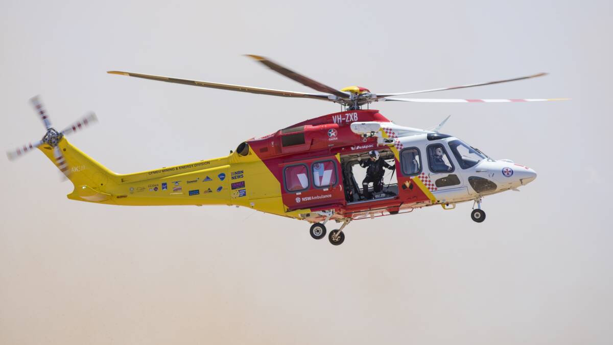 EMERGENCY: The Westpac Rescue Helicopter Service was tasked to Tamworth hospital to transport a girl who was injured when she fell off a horse. Photo: WRHS