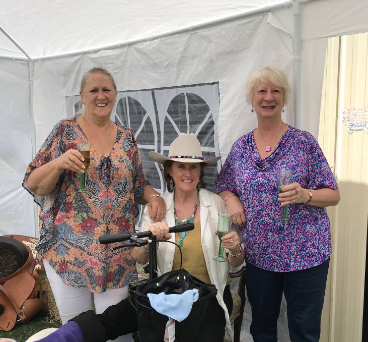 REMINISCING: Cheryl Gray, Ros Lindsay and Bev James celebrate the Reg Lindsay Memorial Barn, which has been more than four years in the making. Photo: Supplied