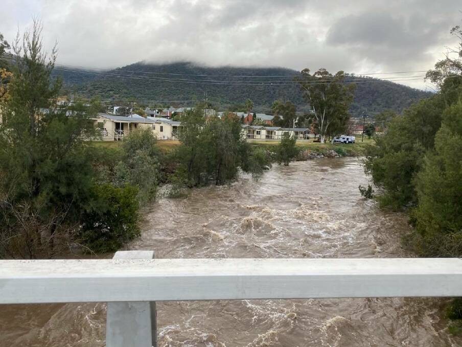 FLOOD WARNING: The Peel River at Paradise Bridge was raging on Friday morning, and is still on the rise. Photo: Anna Falkenmire