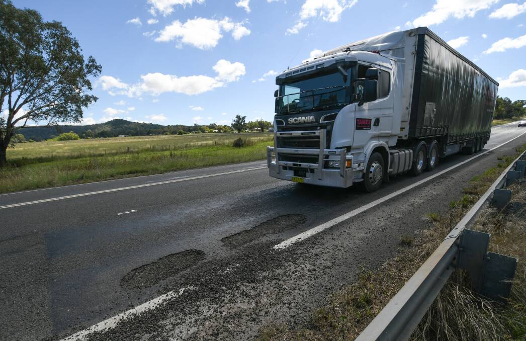 PRIORITISING: Transport for NSW crews will be responsible for patching up the New England Highway after heavy traffic and heavy rain wreaked havoc. Photo: Gareth Gardner