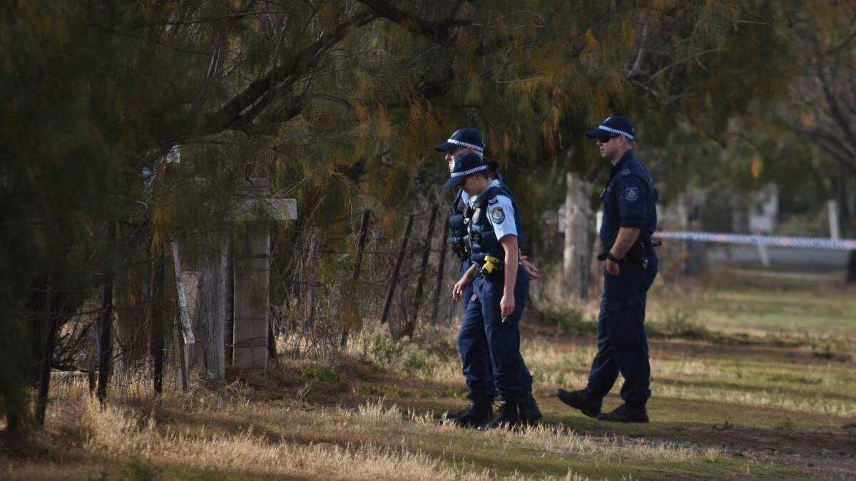 INVESTIGATIONS: Police combed the scene of a Hillvue home on the outskirts of Tamworth after a deadly fire ripped through two years ago. Photo: Ben Jaffrey